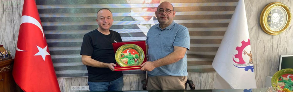 Akhisar Pazarcılar Esnaf Odası Başkanına Güral’a ahde vefa plaketi